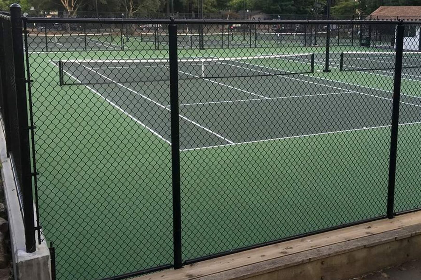 Specimesh fencing providing security for a residential backyard.