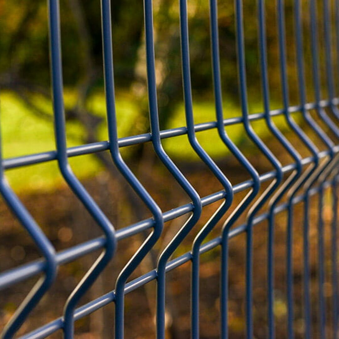 Close-up view of a premium weldmesh fence installed in a commercial space.
